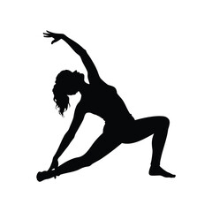 Fototapeta premium Silhouette of a woman in a yoga pose, extended side angle pose