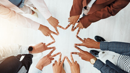 Obraz premium Business people, meeting and top view of star with hands, collaboration or team building. Above, community or group of employees with fingers in office for synergy, strategy or solidarity together