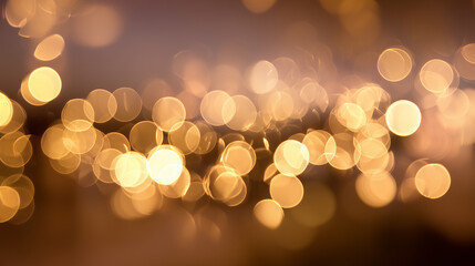 Golden Bokeh Lights Background: A beautiful soft-focus abstract background of warm, golden bokeh lights, perfect for holidays and celebrations.