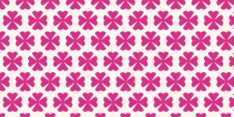 Seamless pattern with pink four-leaf clover motif