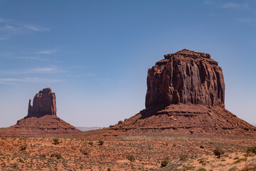 Fototapeta premium East Mitten Butte and Merrick Butte, Monument Valley, Arizona. Shinarump Conglamerate、Moenkopi Formation、De Chelly Sandstone with Organ Rock Formation / Shale.