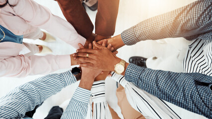 Fototapeta premium Stack of hands, teamwork and business people in office with support, collaboration or unity. Trust, top view and group of corporate employees in huddle for solidarity, motivation or meeting together.