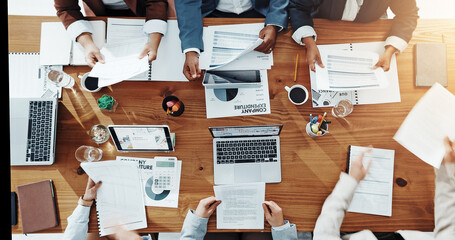 Business, hands and people with paperwork in meeting for company expenditure, budget and auditing. Above, accounting teamwork and screen for revenue stats, financial analysis or forecasting in office