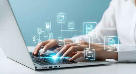 A person using a laptop, interacting with digital file icons and data streams.