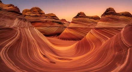 Fototapeten Scenic landscape showcasing the Wave sandstone formation with its beautiful patterns and warm sunset hues in the desert © Seanghai