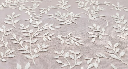 Elegant off-white embroidered fabric with a delicate leaf pattern, showcasing intricate detailing and a subtle texture