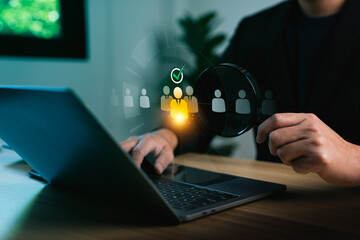 HR manager selecting the right candidate using digital recruitment technology, magnifying glass...