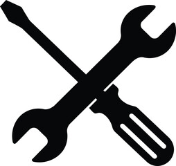 A wrench and screwdriver are crossed isolated on white background