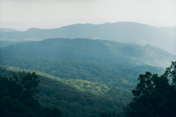 Mountain view from Doi Inthanon, Chiang Mai, Thailand – scenic landscape with lush green hills, misty peaks, and tropical nature.