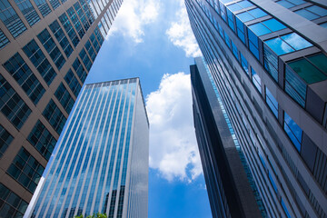 A cityscape of moving cloud reflecting the office building at the business town low