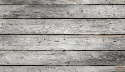 Weathered gray wood planks create a rustic background texture ideal for design projects needing a vintage feel.