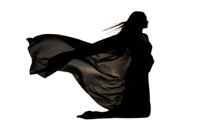 Silhouette of woman kneeling with flowing black fabric on white background
