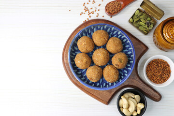 Gond and Methi Ke Laddu or Pinni. Fenugreek Laddu Made From Fenugreek Seeds, Saunf, Jaggery, and nuts. Immunity booster food for winters. Copy space