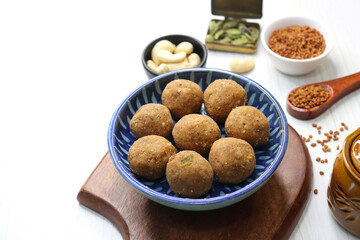 Gond and Methi Ke Laddu or Pinni. Fenugreek Laddu Made From Fenugreek Seeds, Saunf, Jaggery, and nuts. Immunity booster food for winters. Copy space