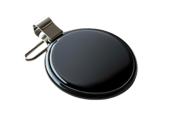 Black oval clip-on badge with metallic shine and safety pin back detail on minimal layout isolated on a transparent background