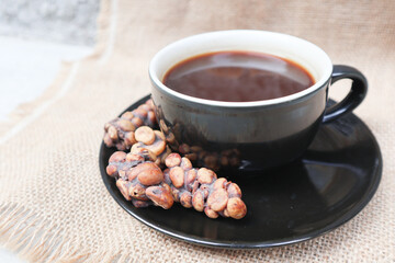 Kopi Luwak Coffee Bean or Civet coffee bean with Cup of Kopi Luwak coffee, world's most expensive coffee from indonesia