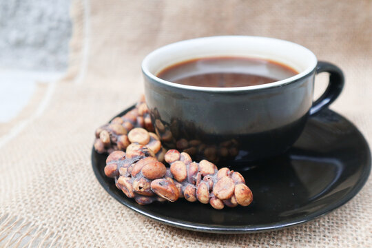 Kopi Luwak Coffee Bean or Civet coffee bean with Cup of Kopi Luwak coffee, world's most expensive coffee from indonesia