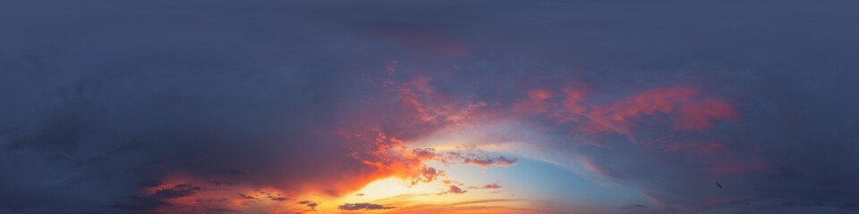 Sunset sky with bright glowing pink Cumulus clouds. Seamless spherical HDR 360 panorama. Full...
