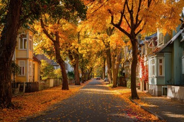 Autumnal street lined with colorful houses and trees.