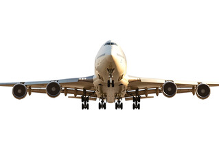Fototapeta premium Front view of a large white passenger airplane with landing gear down isolated on transparent background