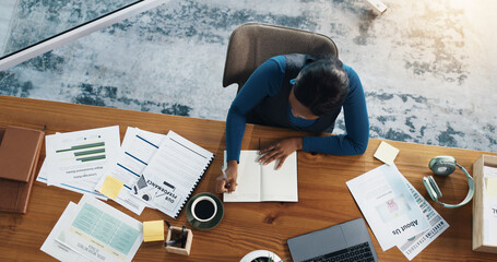 Above, woman and notebook for writing, content marketing expert and strategy notes in office. Paperwork, planning and social media strategist with info for creative project on online platform at desk