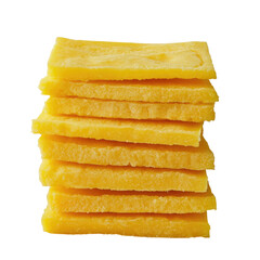 Stack of yellow polenta squares for cooking and food photography close up studio shot