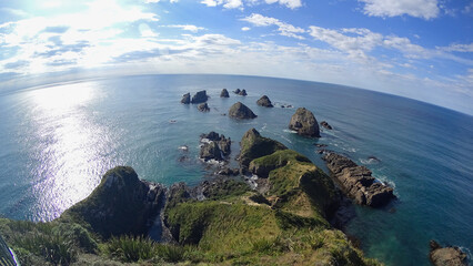 Panoramic View of Rocky Islands in Blue Ocean