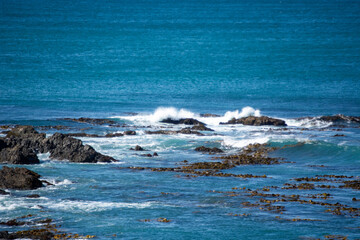 Scenic Ocean View with Waves and Rocks