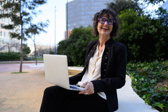 Confident businesswoman working outdoors in barcelona