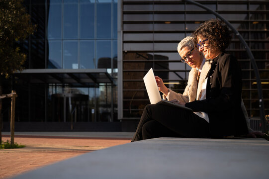 Businesswomen working with laptop in barcelona, spain