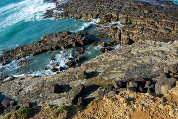 Rocky Coastline with Turquoise Waves