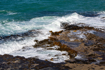 Waves Crashing on Rocky Shoreline