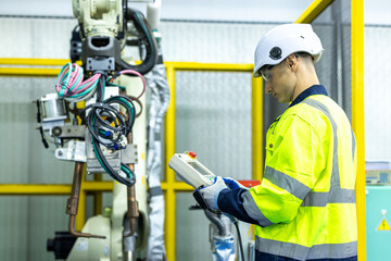Male and femal engineers checking or maintenance electronic in AI or artificial intelligence Robot,...