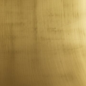 Textured surface of hammered antique brass sheet, showcasing rich patina and artisanal craftsmanship&mdash;a close-up view of aged metal with unique imperfections.