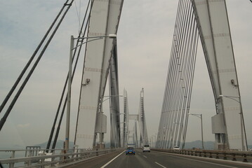 Fototapeta premium 鳴門海峡大橋のケーブルと海風