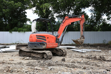Excavator on earthworks on construction area of industrial building in construction site.Earthmoving construction equipment
