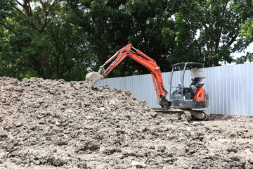 Excavator on earthworks on construction area of industrial building in construction site.Earthmoving construction equipment