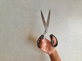 scissors in hand
