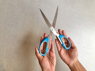 hand with scissors