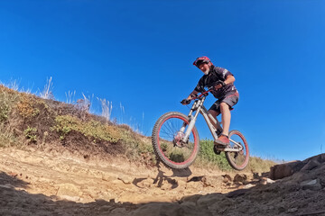 Mountain biker riding on the sand