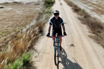 Cyclist Riding the Mountain Bike
