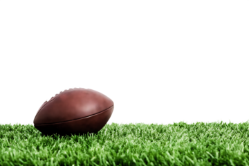 Brown football on green grass isolated on a transparent background