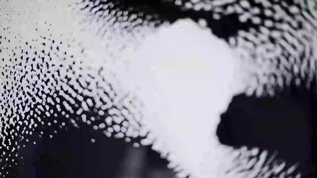 Black and white minimalist ink flow background, slow motion abstract ink textures moving smoothly

