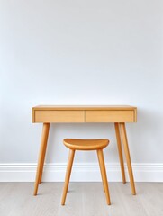 Minimalist Writing Desk in Softly Lit Room with Copy Space on Clean White Wall