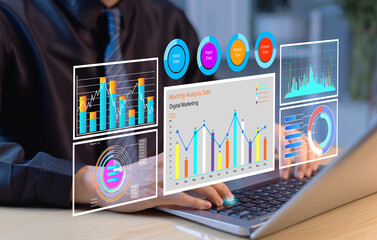Businessmen using computers to develop and analyze IT management systems, plan marketing...