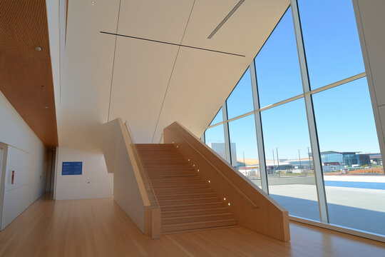 Converging lines in an ascending staircase create impact