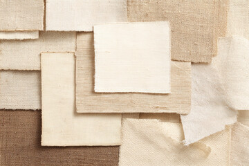 Overlapping neutral fabric and paper swatches beige cream and brown textile samples natural fiber abstract composition soft texture minimalist style interior design inspiration