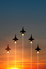 Air Force Day. Aircraft silhouettes on background of sunset. Combat flight of interceptors on a...