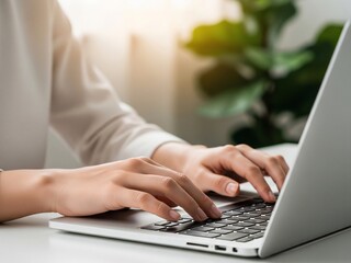 Fototapeta premium woman typing on laptop