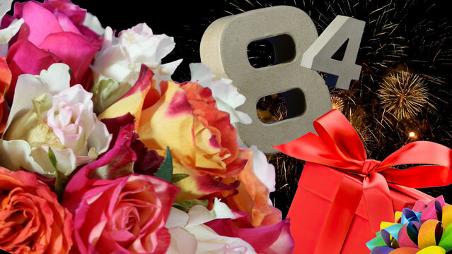 Birthday card  in numbers , roses, gift, fireworks light sky. Age is 84